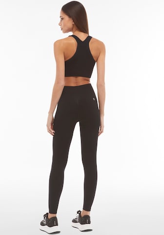 Freddy Skinny Workout Pants in Black