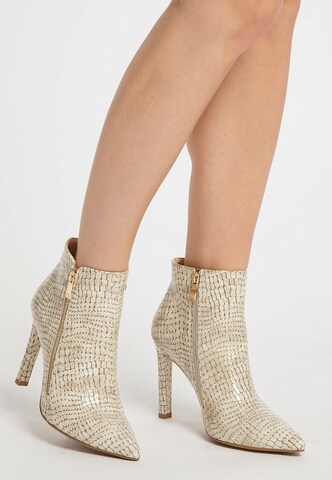 faina Ankle Boots in Beige
