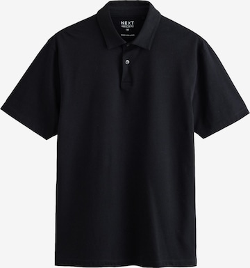 Tricou de la Next pe negru: față