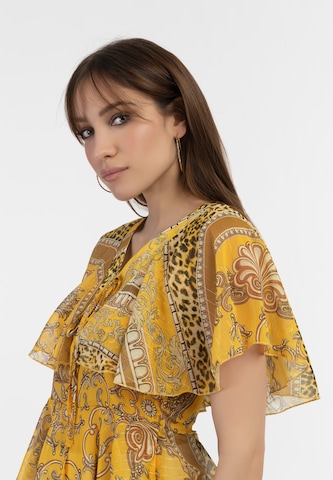 Camicia da donna di faina in giallo