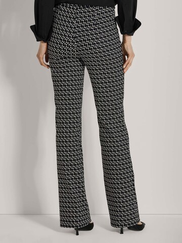 MADELEINE Flared Broek in Zwart