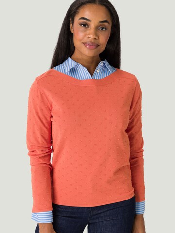 Pullover di zero in arancione