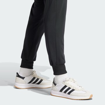ADIDAS SPORTSWEAR Træningsdragt 'Essentials Feel Cozy' i sort