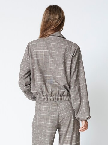 Veste mi-saison 'Claudine' co'couture en marron