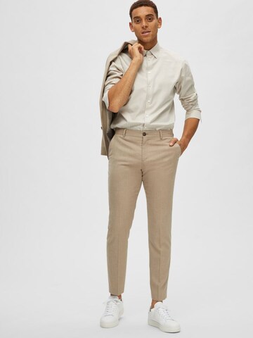 SELECTED HOMME Slim fit Trousers with creases in Beige