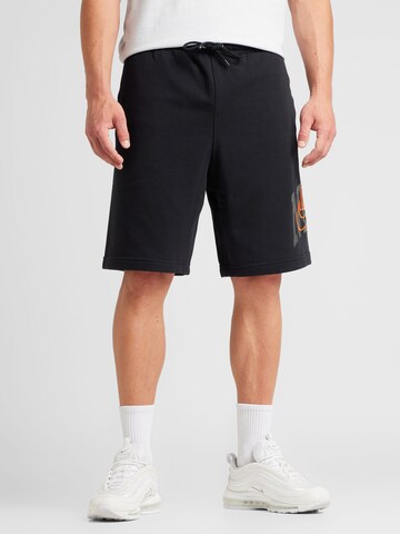 Nike Sportswear Loose fit Sports trousers 'CLUB' in Black: front