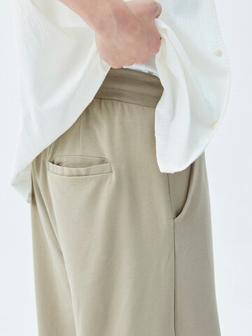Wide leg Pantaloni 'Humble' di VAMOS CLO in beige