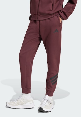 ADIDAS SPORTSWEAR Tapered Sports trousers 'Future Icons' in Red: front