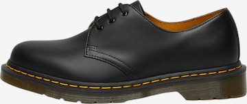 Chaussure à lacets Dr. Martens en noir : devant
