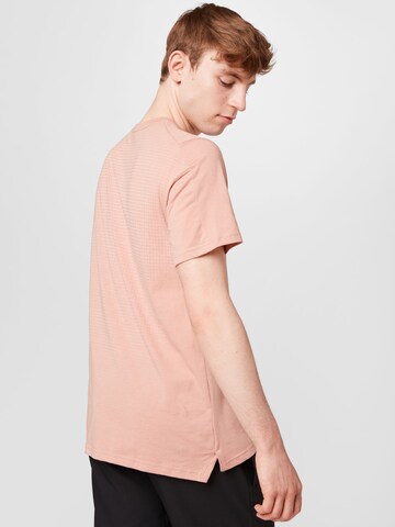 NIKE Functioneel shirt 'Burnout' in Roze