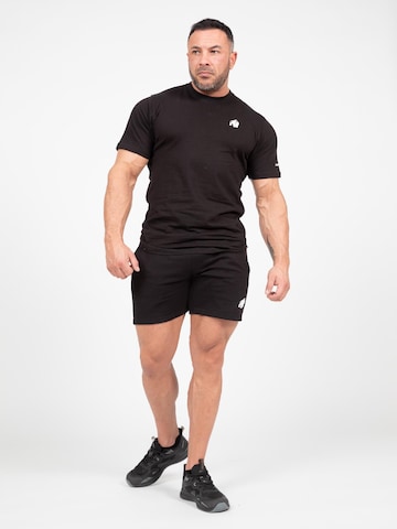 Slimfit Pantaloni 'Leon' di Gorilla Wear in nero