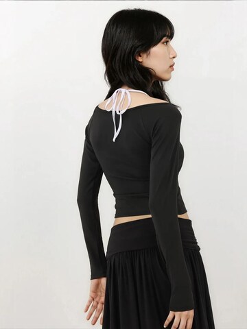 Hiccup - Top de malha em preto