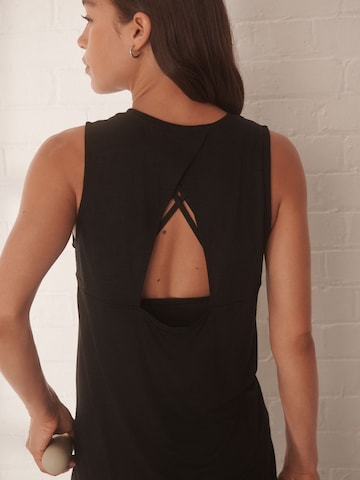 Next Спортивный топ в Черный