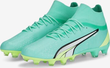 PUMA - Chuteira em verde