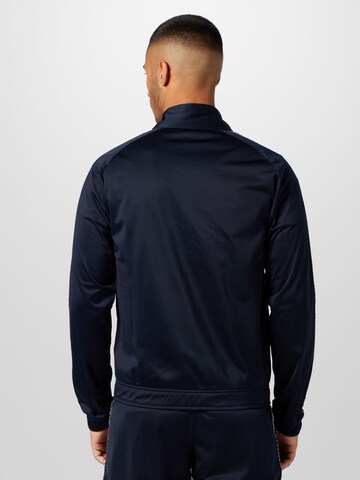 Champion Authentic Athletic Apparel Tracksuit in Blue