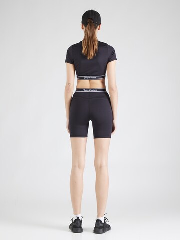 Skinny Pantaloni sport de la Juicy Couture Sport pe negru