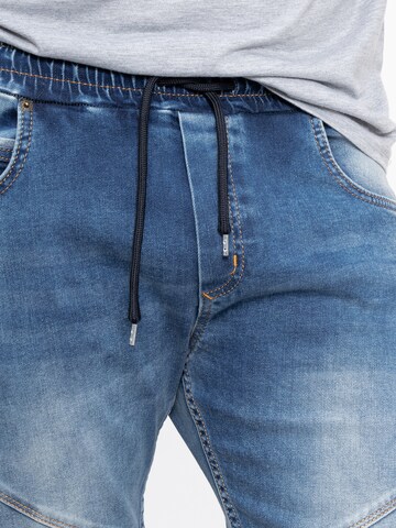Rock Creek Tapered Jeans in Blue