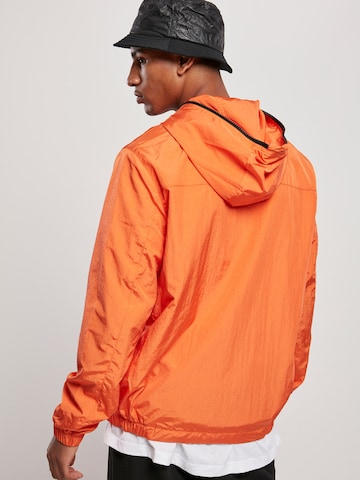 Veste mi-saison Urban Classics en orange