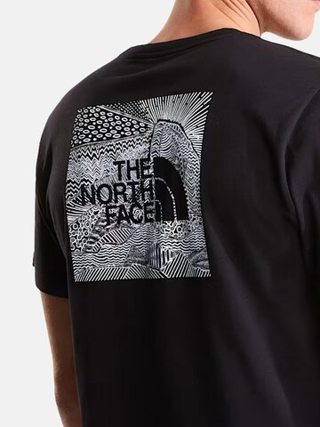 THE NORTH FACE T-shirt 'THE NORTH FACE M BOX NSE CELEBRATION T-SHIRT' i svart