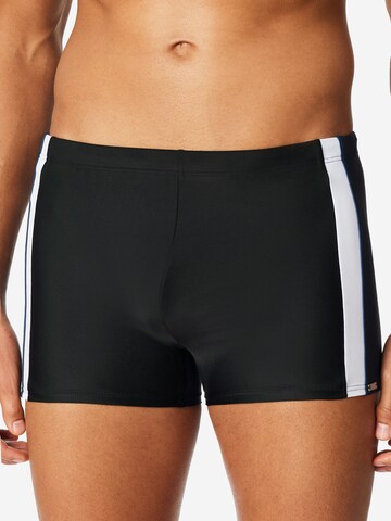 SCHIESSER Board Shorts ' Ocean Swim ' in Black: front