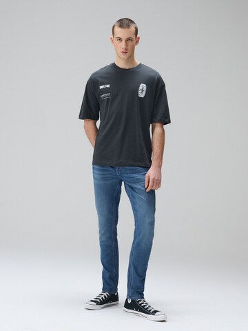 Next Slimfit Farmer 'Motion Flex' - kék