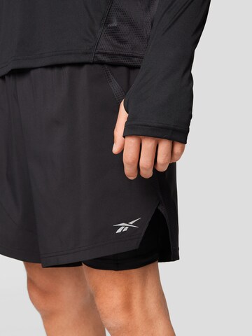 Regular Pantalon de sport Reebok en noir