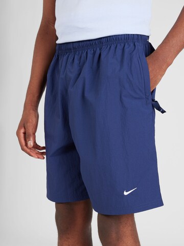 Nike Sportswear Regular Trousers 'Solo' in Blue