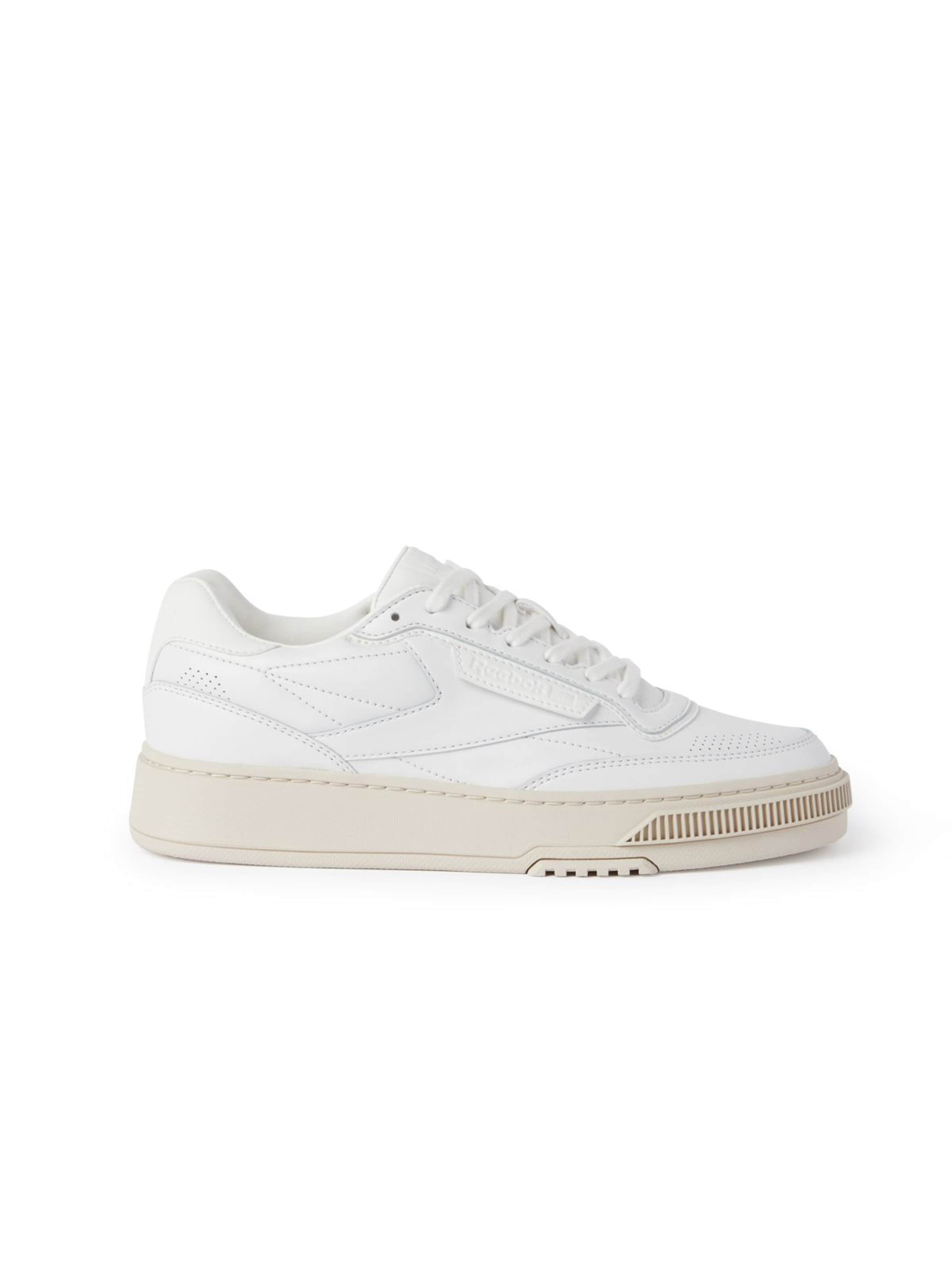 Reebok - Zapatos con cordón en blanco: frente