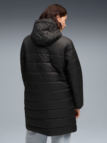 PUMA Übergangsjacke 'Puma Ess Hooded Padded Parka'‌‌‌‌‌ in Schwarz