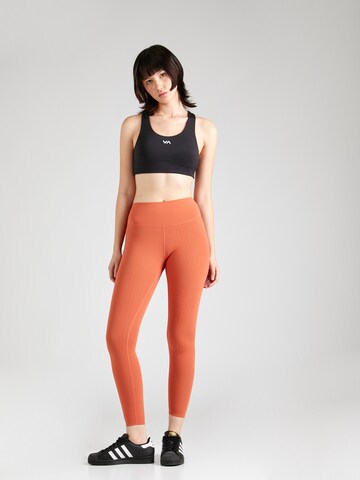 Yvette Sports - Skinny Calças de desporto 'Merle' em laranja