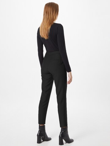 Coupe slim Pantalon à plis UNITED COLORS OF BENETTON en noir