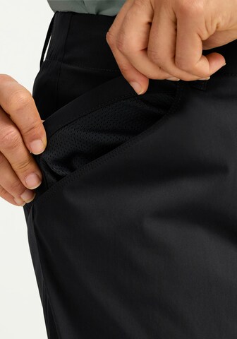 JACK WOLFSKIN Loose fit Outdoor Pants in Black