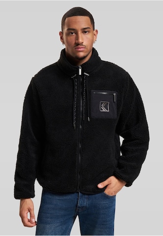 Karl Kani Between-season jacket in Black: front