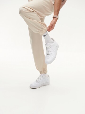 Tapered Pantaloni 'Enno' di Smiles in bianco