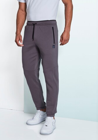 JOHN DEVIN Tapered Trousers in Grey: front