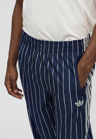 ADIDAS ORIGINALS Normalny krój Spodnie 'FIREBIRD' w kolorze niebieski
