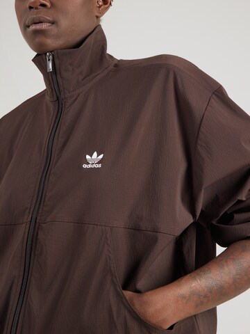 auksinė ADIDAS ORIGINALS Demisezoninė striukė 'ESS WB'