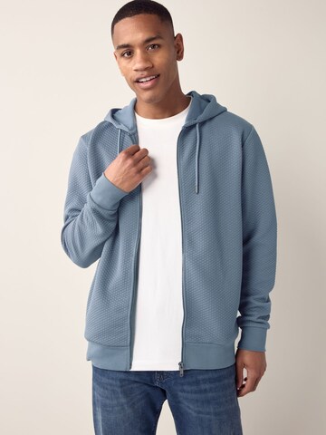 Veste de survêtement Next en bleu : devant