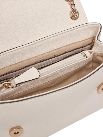 Borsa a spalla 'YESBA CONVERTIBLE XBODY FLAP HWBG78 33210' di GUESS in beige