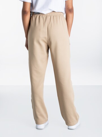 PUMA Loose fit Workout Pants 'T7' in Beige