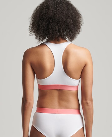 Bustier Soutien-gorge de sport Superdry en blanc