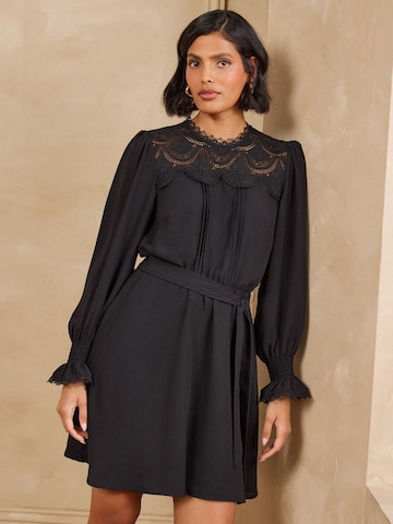 Rochie de la love & roses pe negru