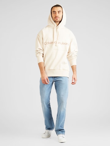 Calvin Klein Jeans Bluzka sportowa w kolorze beżowy