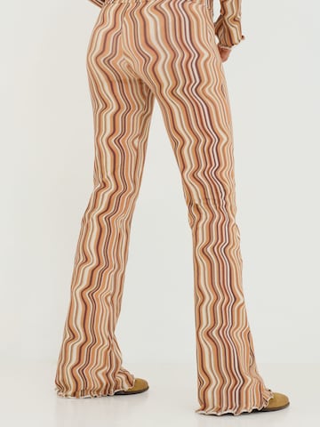 ABOUT YOU x Sofia Tsakiridou Flared Pants 'LOU' in Beige