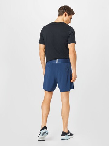 NIKE Regular Sports trousers 'Flex Active' in Blue