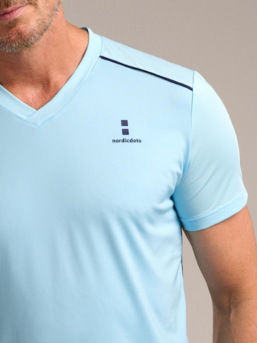 nordicdots Funktionsshirt 'Performance V-Tee'‌‌‌‌‌‌‌ in Blau