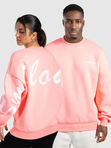 Smilodox Sweatshirt ' Liquid Brail ' in Pink: front