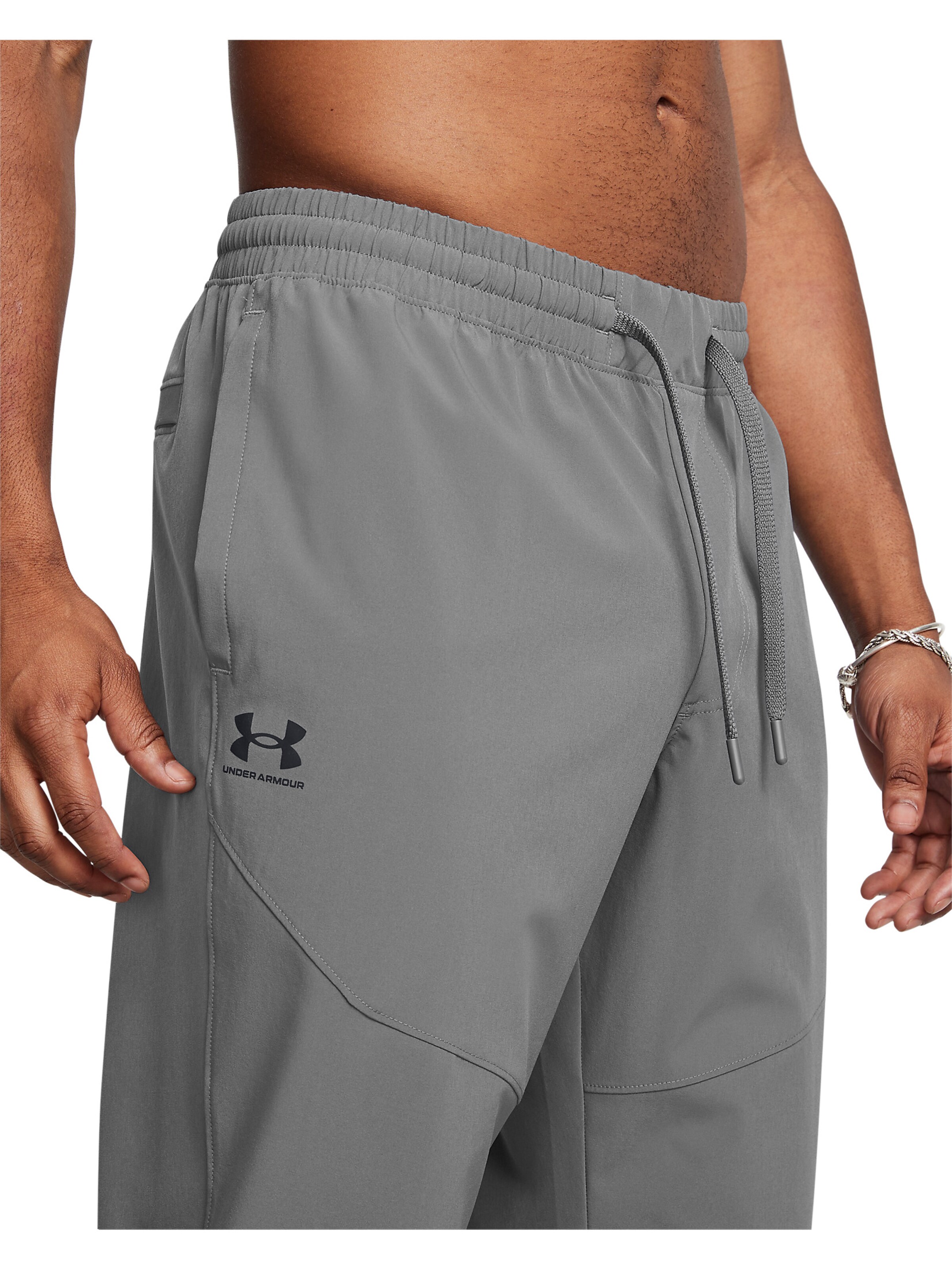 UNDER ARMOUR Tapered Sportbroek in Grijs