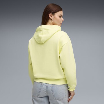 Sweat-shirt 'Essentials Nature 2.0' PUMA en jaune