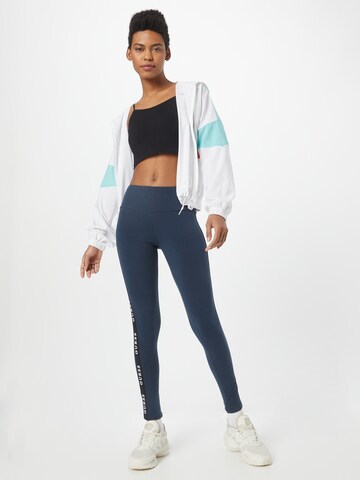 GUESS Skinny Sportovní kalhoty 'ALINE' – modrá